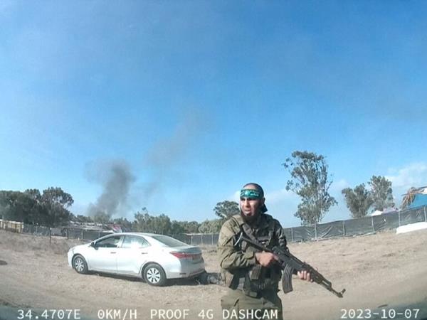 A Hamas terrorist leading a festival-goer